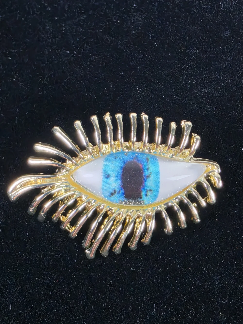 Gold Eyelash Eye Brooch with Blue Enamel Accent